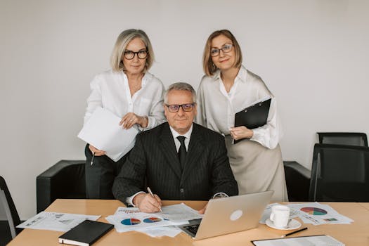 Professional financial planning team at desk